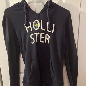 navy blue and white Hollister hoodie